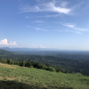 photo of green hills in the distance